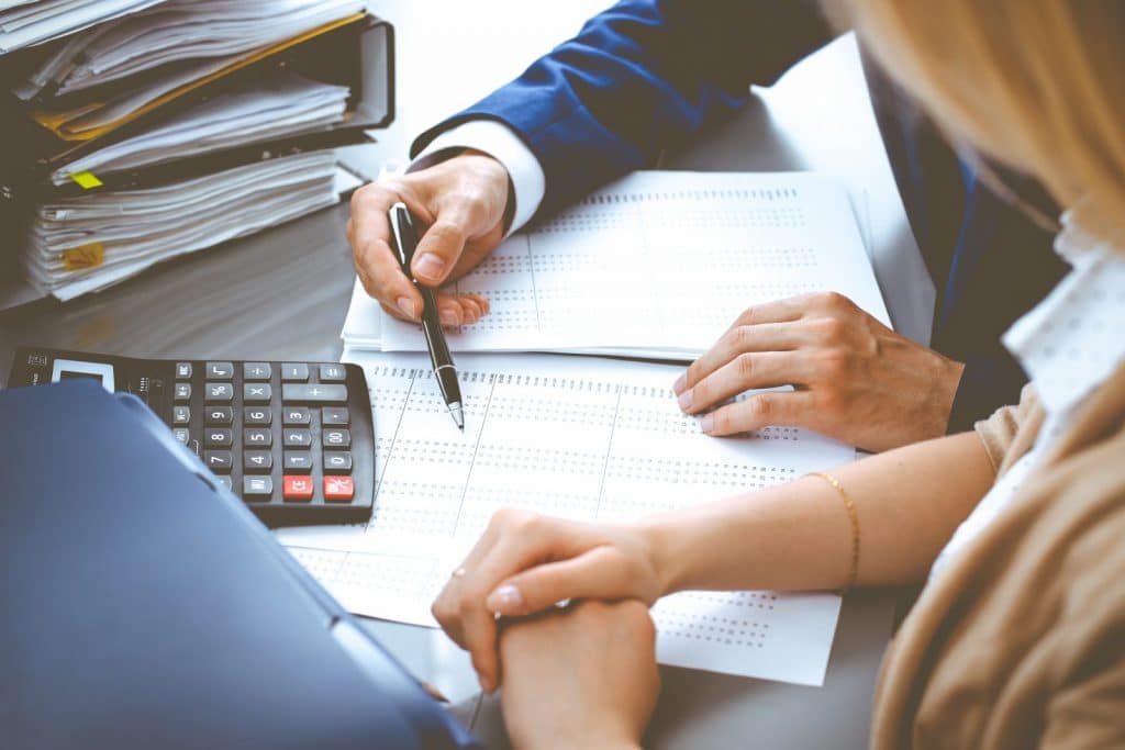 Woman consulting an accountant for bookkeeping and payroll services